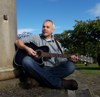 Bob Murray with guitar