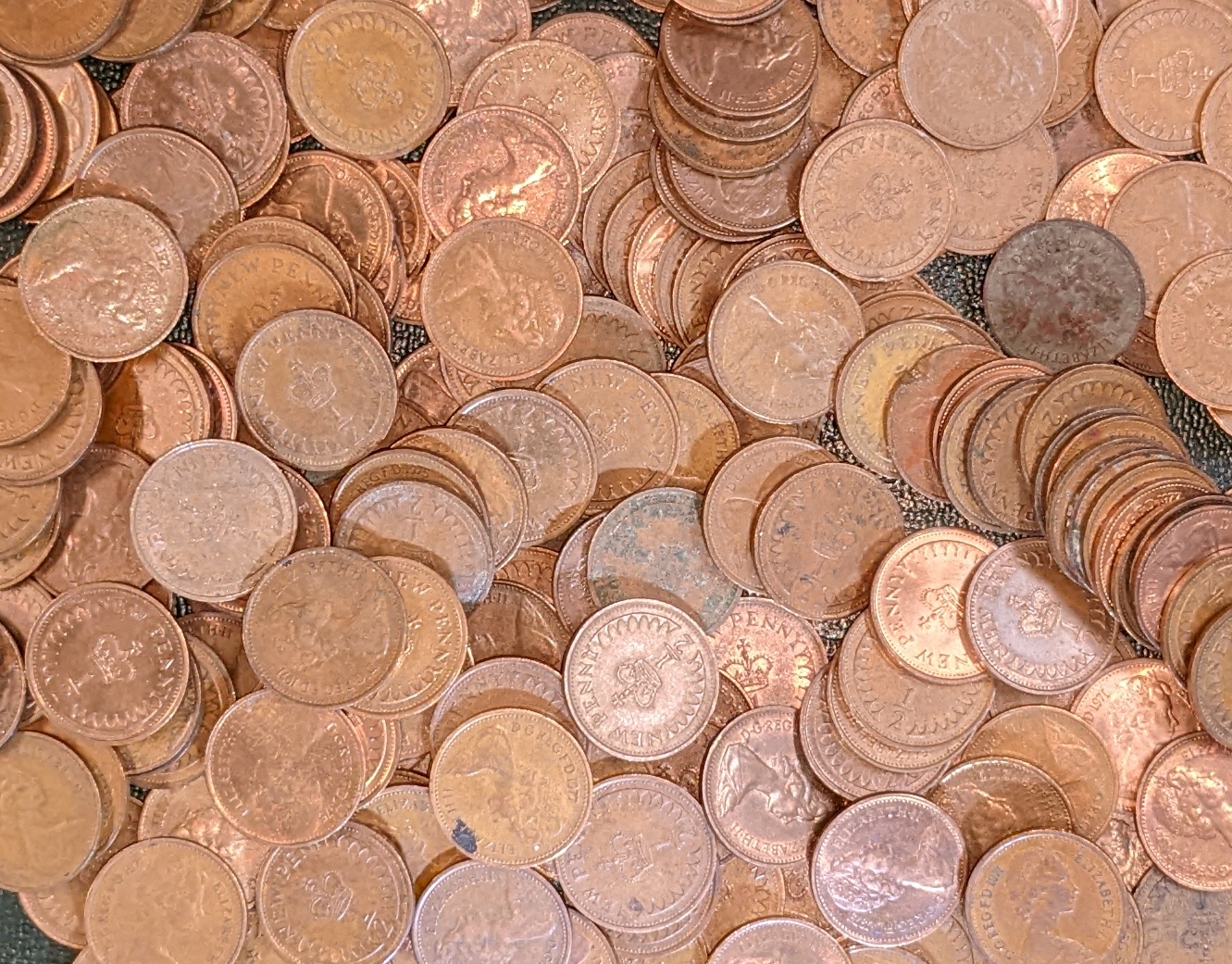 decimal halfpenny coins in quantity